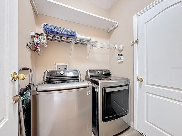 799 Hacienda Cir, Kissimmee, FL 34741 - laundry room featuring separate washer and dryer