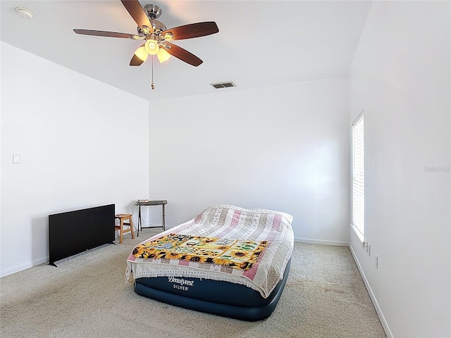 799 Hacienda Cir, Kissimmee, FL 34741 - bedroom featuring carpet flooring and a ceiling fan