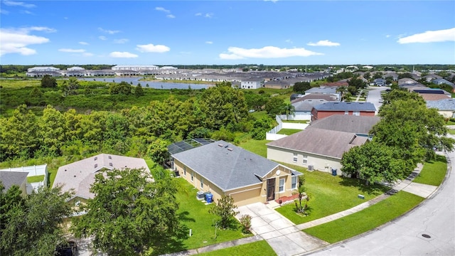 799 Hacienda Cir, Kissimmee, FL 34741 - aerial perspective of suburban area featuring a large body of water