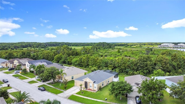799 Hacienda Cir, Kissimmee, FL 34741 - aerial view of residential area with a heavily wooded area