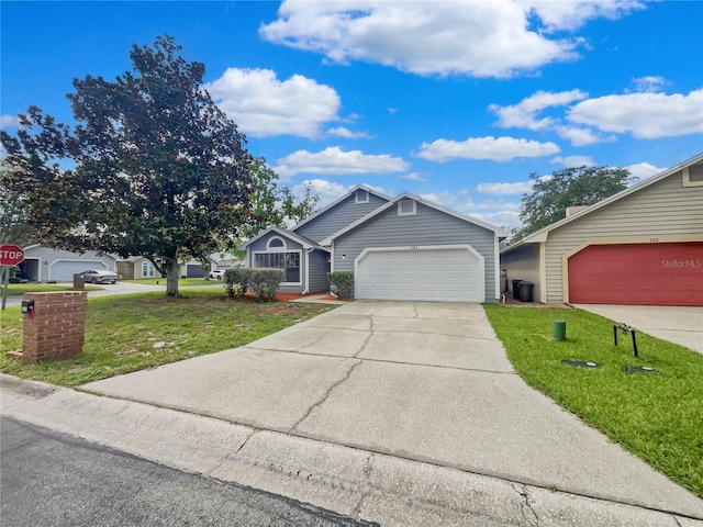 101 Whitley Bay Ln, Longwood, FL 32779 - view of front of home with a front lawn, driveway, and a garage