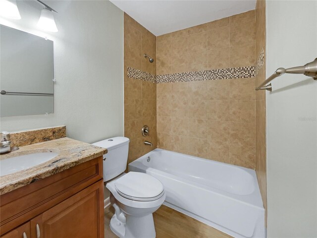 101 Whitley Bay Ln, Longwood, FL 32779 - bathroom with vanity,  shower combination, and wood finished floors