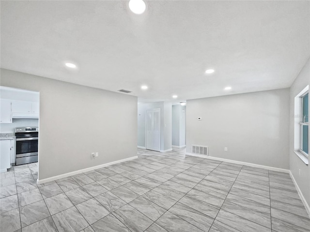 2607 Castle Oak Ave, Orlando, FL 32808 - empty room featuring recessed lighting