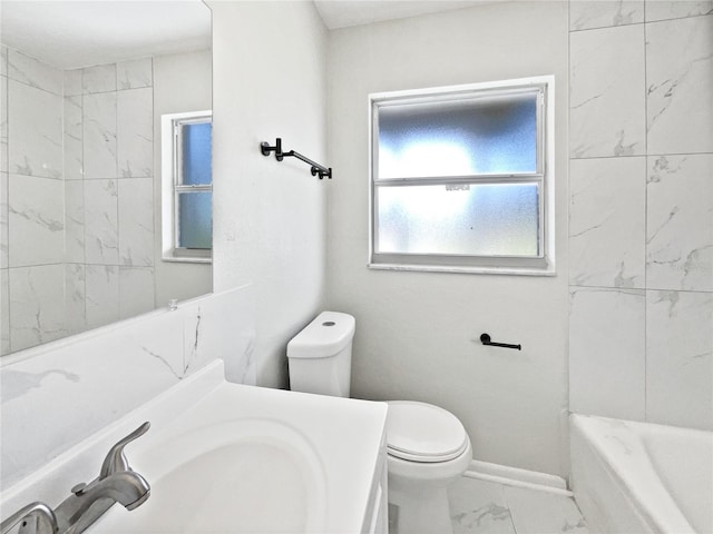 2607 Castle Oak Ave, Orlando, FL 32808 - bathroom with marble finish flooring, vanity, and  shower combination