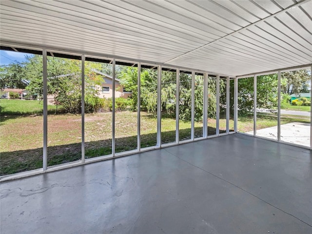 2607 Castle Oak Ave, Orlando, FL 32808 - unfurnished sunroom featuring plenty of natural light