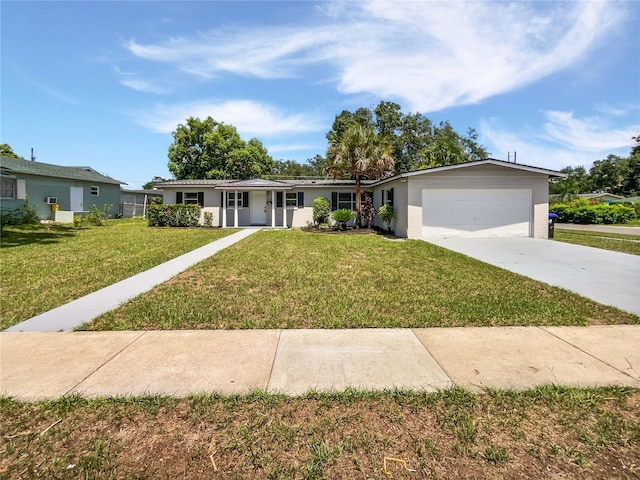2607 Castle Oak Ave, Orlando, FL 32808 - ranch-style home featuring a front yard, a garage, and concrete driveway