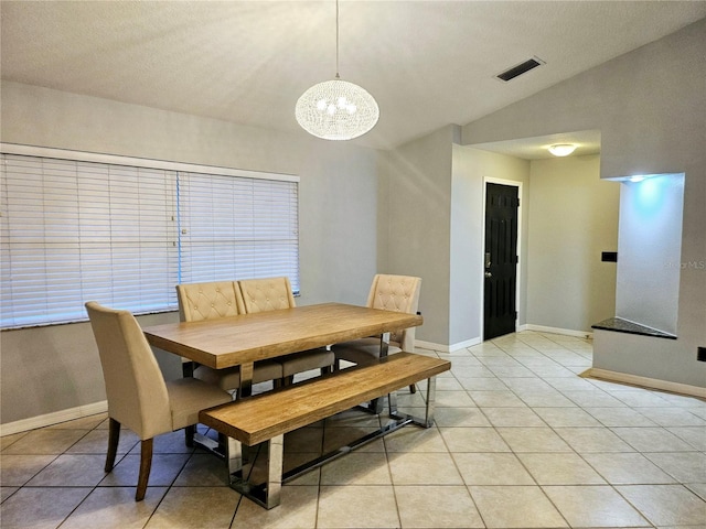 2010 Appian Ct, Deltona, FL 32725 - dining area featuring a chandelier, light tile patterned floors, and lofted ceiling