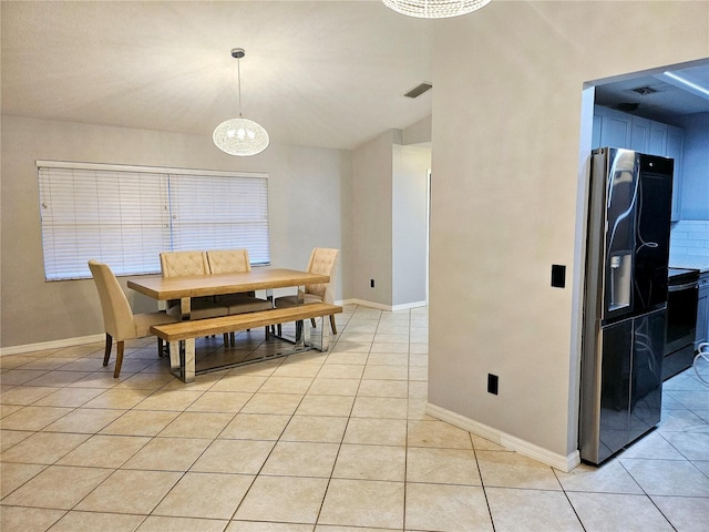 2010 Appian Ct, Deltona, FL 32725 - dining space featuring light tile patterned floors and a chandelier