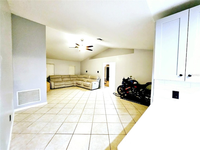2010 Appian Ct, Deltona, FL 32725 - living room with vaulted ceiling, light tile patterned flooring, and a ceiling fan
