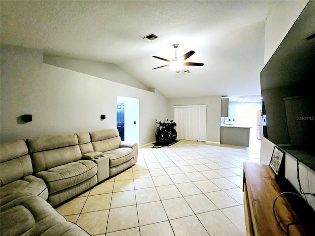 2010 Appian Ct, Deltona, FL 32725 - living room with a ceiling fan, light tile patterned floors, and vaulted ceiling