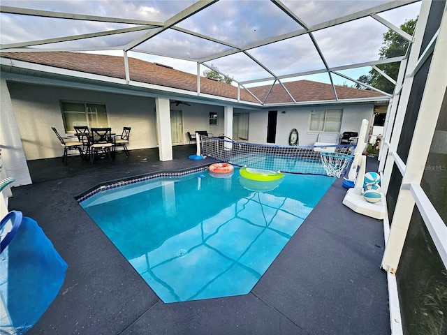 2010 Appian Ct, Deltona, FL 32725 - swimming pool featuring a patio, ceiling fan, a lanai, and outdoor dining area