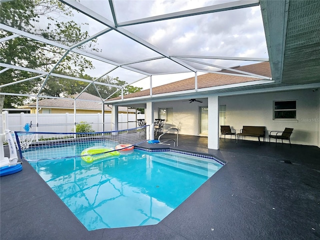 2010 Appian Ct, Deltona, FL 32725 - view of swimming pool featuring a ceiling fan, a patio area, and glass enclosure