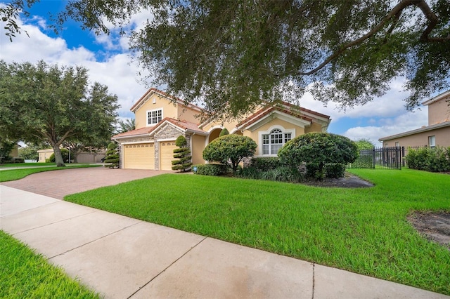 2258 Rickover Pl, Winter Garden, FL 34787 - view of front facade featuring decorative driveway, a garage, and stucco siding
