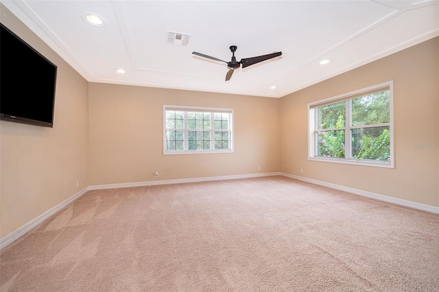 2258 Rickover Pl, Winter Garden, FL 34787 - empty room with healthy amount of natural light, ceiling fan, recessed lighting, light colored carpet, and crown molding