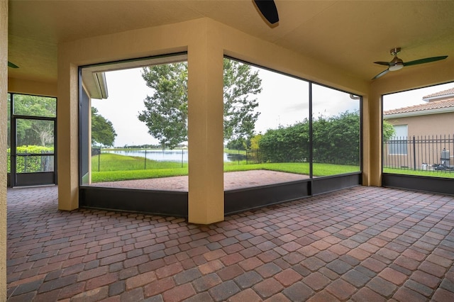 2258 Rickover Pl, Winter Garden, FL 34787 - unfurnished sunroom featuring ceiling fan, a water view, and healthy amount of natural light