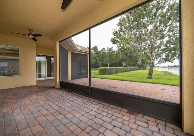 2258 Rickover Pl, Winter Garden, FL 34787 - unfurnished sunroom featuring ceiling fan and a water view