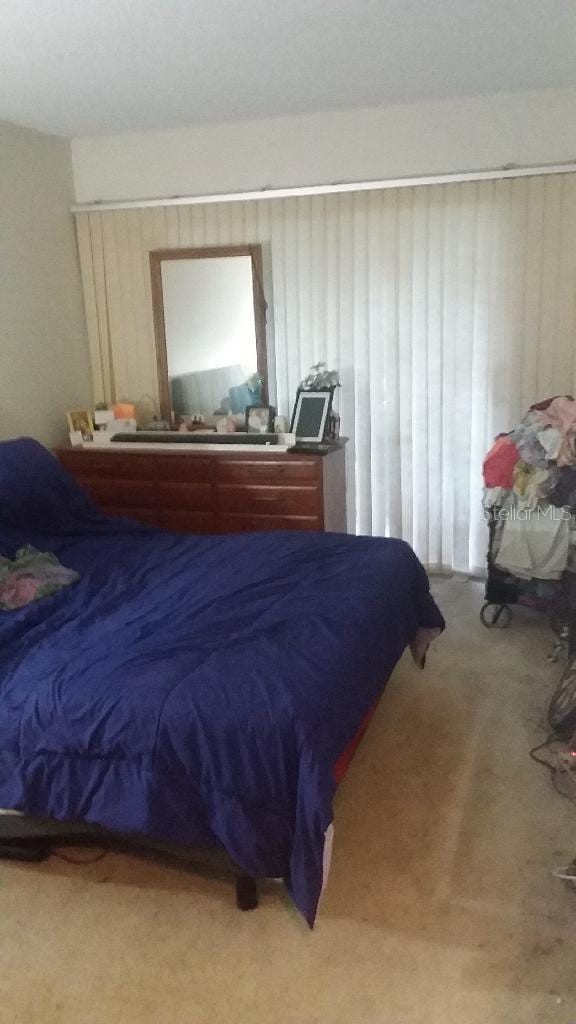 56 Brighton B 56, Boca Raton, FL 33434 - bedroom featuring light carpet