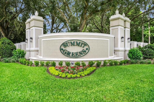 785 Hawks Blf, Clermont, FL 34711 - community sign featuring a lawn