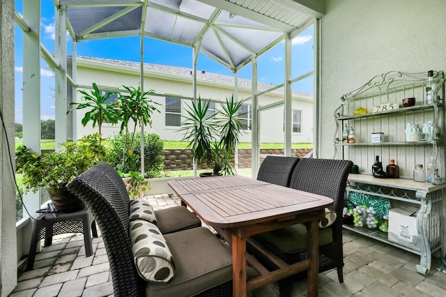 785 Hawks Blf, Clermont, FL 34711 - sunroom / solarium with outdoor dining space and lofted ceiling