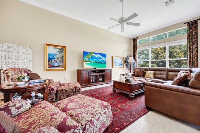 785 Hawks Blf, Clermont, FL 34711 - tiled living area with ceiling fan, lofted ceiling, and ornamental molding