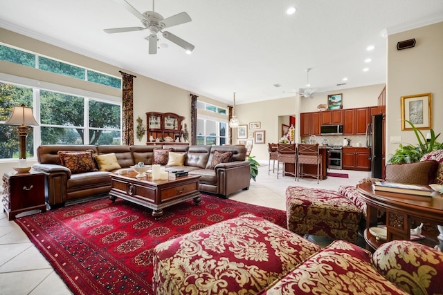 785 Hawks Blf, Clermont, FL 34711 - living room featuring light tile patterned floors, a ceiling fan, recessed lighting, and ornamental molding