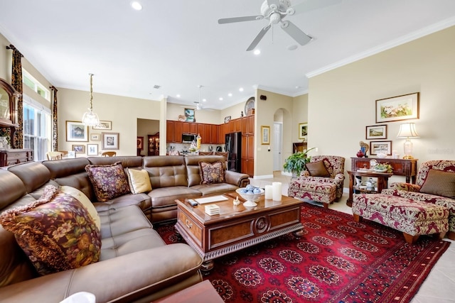 785 Hawks Blf, Clermont, FL 34711 - living room featuring ceiling fan, recessed lighting, arched walkways, and crown molding