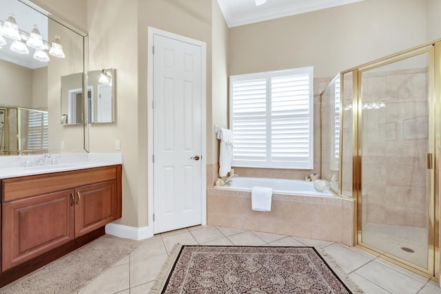 785 Hawks Blf, Clermont, FL 34711 - full bathroom with vanity, a bath, a shower stall, tile patterned flooring, and ornamental molding