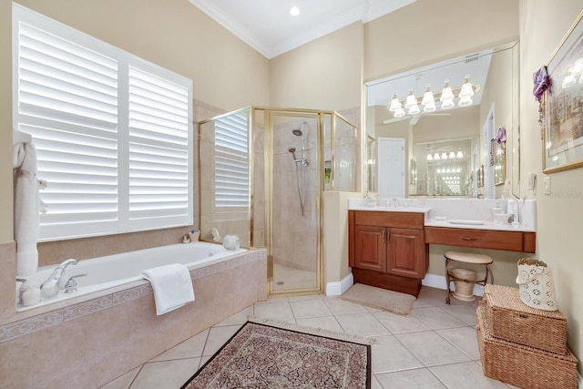 785 Hawks Blf, Clermont, FL 34711 - bathroom featuring a garden tub, tile patterned floors, a shower stall, vanity, and healthy amount of natural light