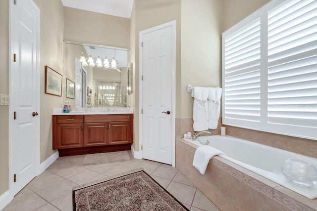 785 Hawks Blf, Clermont, FL 34711 - full bathroom with vanity, a garden tub, tile patterned floors, and plenty of natural light