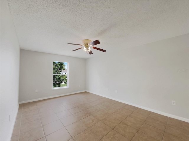 1726 Sunset Ridge Dr, Mascotte, FL 34753 - unfurnished room with a ceiling fan, light tile patterned floors, and a textured ceiling