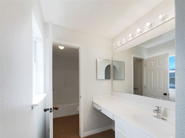 1726 Sunset Ridge Dr, Mascotte, FL 34753 - bathroom with vanity, tile patterned flooring, and a bathtub