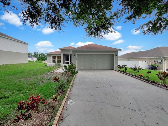 1726 Sunset Ridge Dr, Mascotte, FL 34753 - ranch-style house featuring an attached garage, stucco siding, a front yard, and driveway