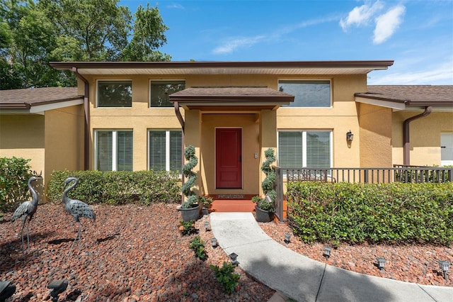 9342 Bay Vista Estates Blvd, Orlando, FL 32836 - view of front of home with stucco siding