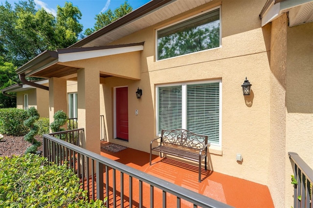9342 Bay Vista Estates Blvd, Orlando, FL 32836 - property entrance with stucco siding