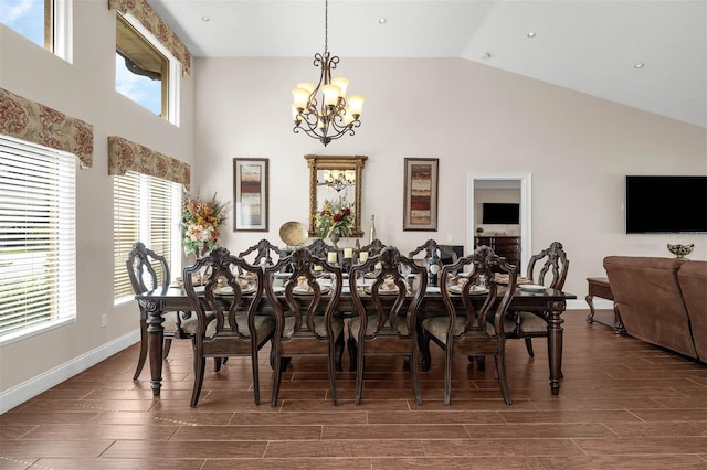 9342 Bay Vista Estates Blvd, Orlando, FL 32836 - dining space featuring a chandelier, wood finished floors, and high vaulted ceiling