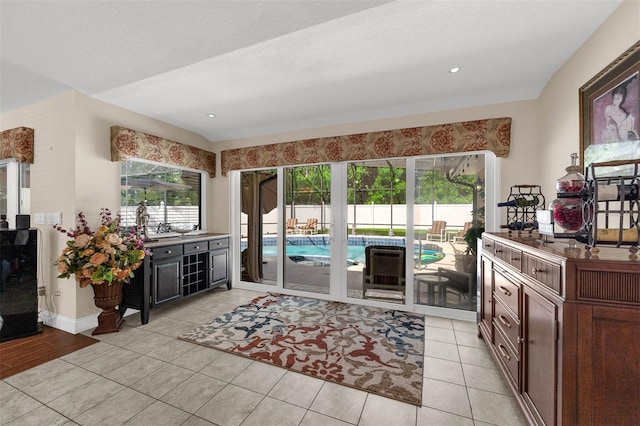 9342 Bay Vista Estates Blvd, Orlando, FL 32836 - kitchen featuring healthy amount of natural light and light tile patterned floors