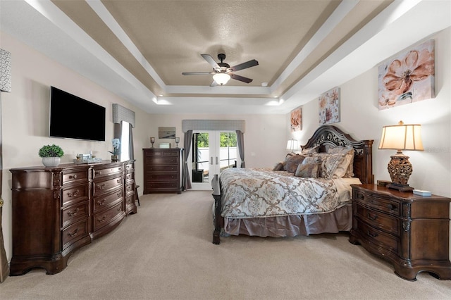 9342 Bay Vista Estates Blvd, Orlando, FL 32836 - bedroom featuring french doors, light colored carpet, access to outside, a raised ceiling, and a ceiling fan