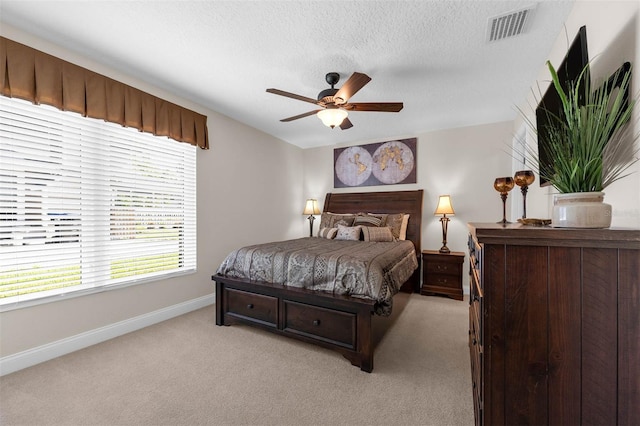 9342 Bay Vista Estates Blvd, Orlando, FL 32836 - bedroom featuring light carpet, a textured ceiling, and ceiling fan