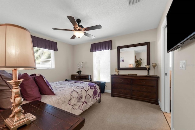 9342 Bay Vista Estates Blvd, Orlando, FL 32836 - carpeted bedroom with ceiling fan and a textured ceiling