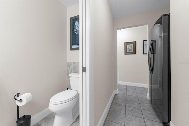 9342 Bay Vista Estates Blvd, Orlando, FL 32836 - bathroom featuring toilet and tile patterned flooring