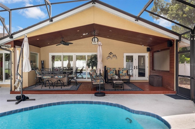 9342 Bay Vista Estates Blvd, Orlando, FL 32836 - outdoor pool featuring french doors, a patio area, ceiling fan, and a lanai