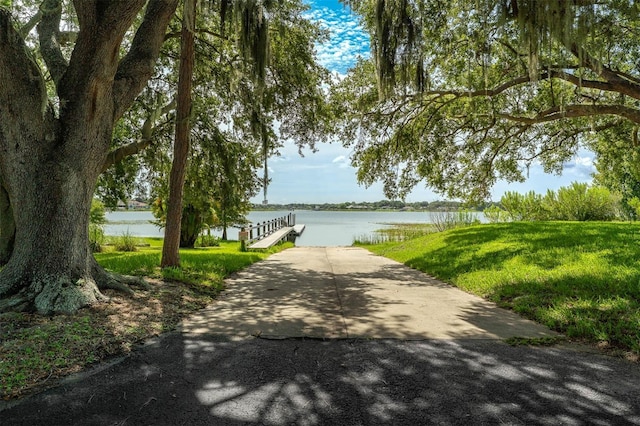 9342 Bay Vista Estates Blvd, Orlando, FL 32836 - view of front facade featuring a boat ramp and a water view
