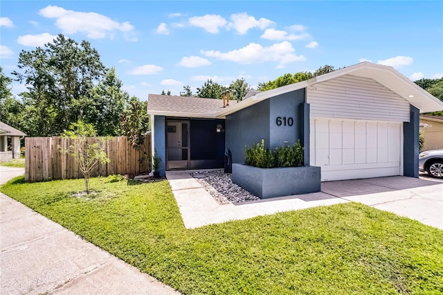 610 Huntly Ln, Winter Springs, FL 32708 - view of front of property featuring an attached garage, driveway, a shingled roof, and a sunroom