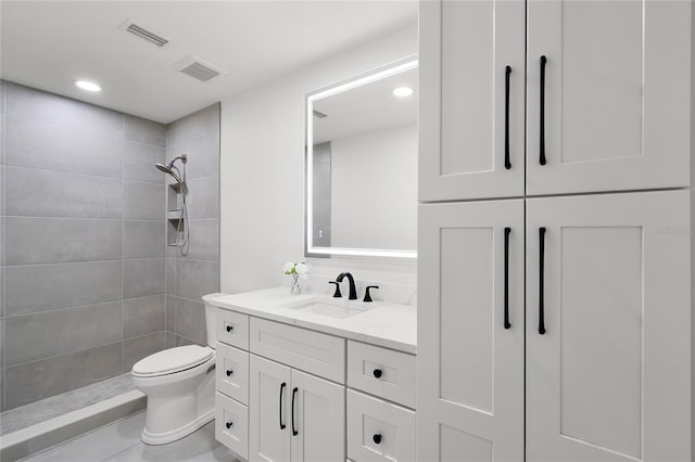 610 Huntly Ln, Winter Springs, FL 32708 - full bath featuring vanity, a tile shower, and recessed lighting
