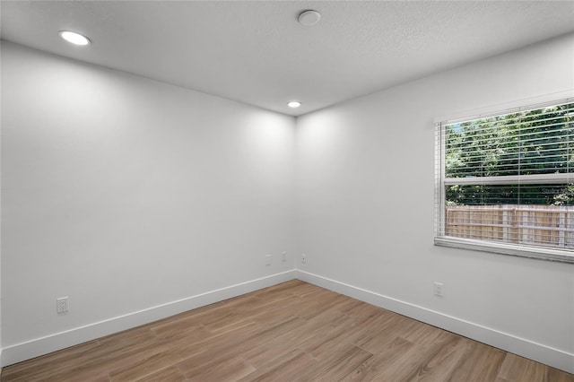 610 Huntly Ln, Winter Springs, FL 32708 - empty room with light wood-style floors and recessed lighting
