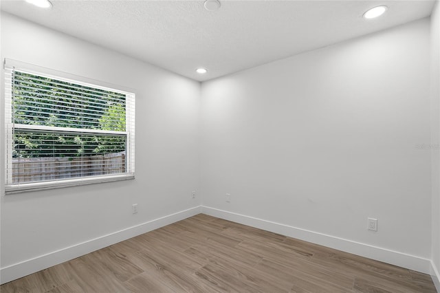 610 Huntly Ln, Winter Springs, FL 32708 - spare room featuring wood finished floors and recessed lighting
