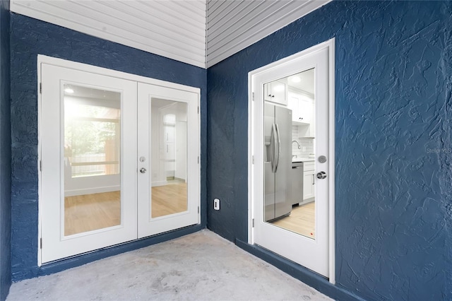 610 Huntly Ln, Winter Springs, FL 32708 - doorway to property featuring french doors and stucco siding