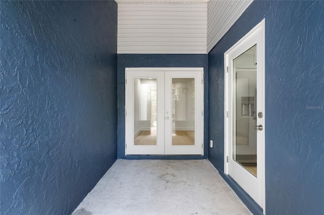 610 Huntly Ln, Winter Springs, FL 32708 - property entrance with french doors and stucco siding