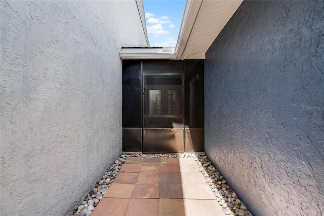 610 Huntly Ln, Winter Springs, FL 32708 - view of exterior entry featuring stucco siding