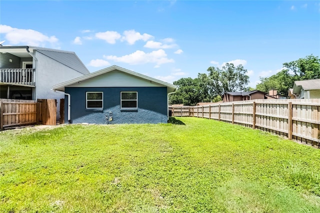 610 Huntly Ln, Winter Springs, FL 32708 - rear view of property featuring stucco siding and a fenced backyard